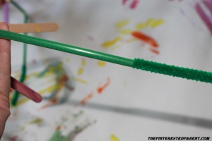 Insert a green pipe cleaner into the straw to add sturdiness & color.